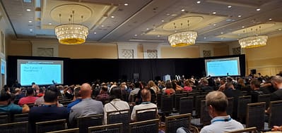 An audience inside the Gaylord National Resort & Convention Center